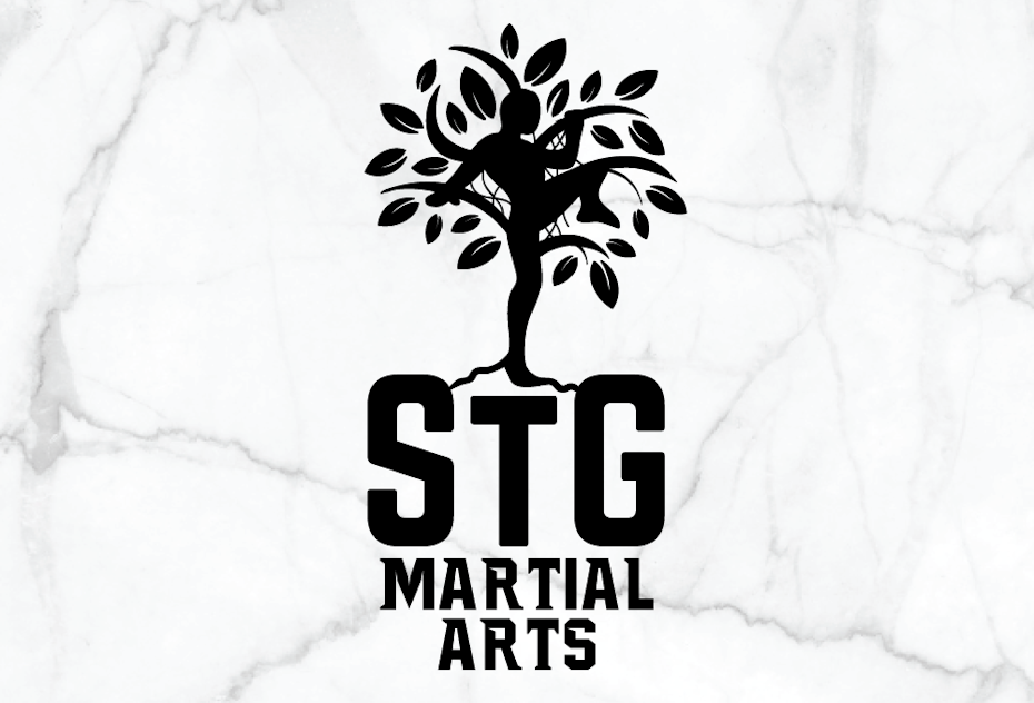  black logo of a person doing martial arts against a tree