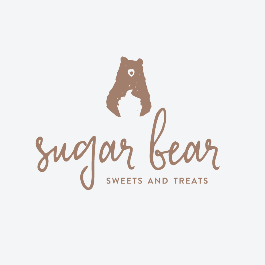 bear logo with a cupcake in the negative space