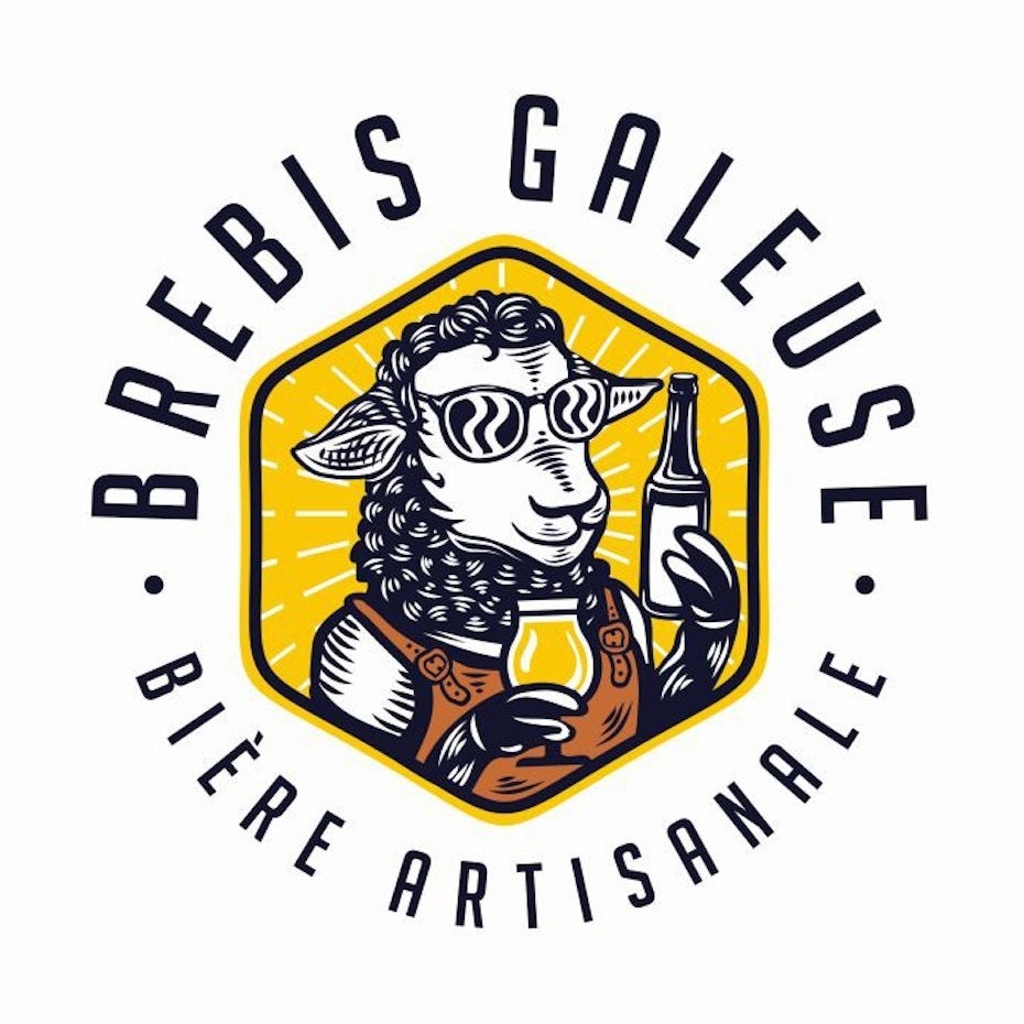 black, gold and white logo of a woman’s head with a moon in the background