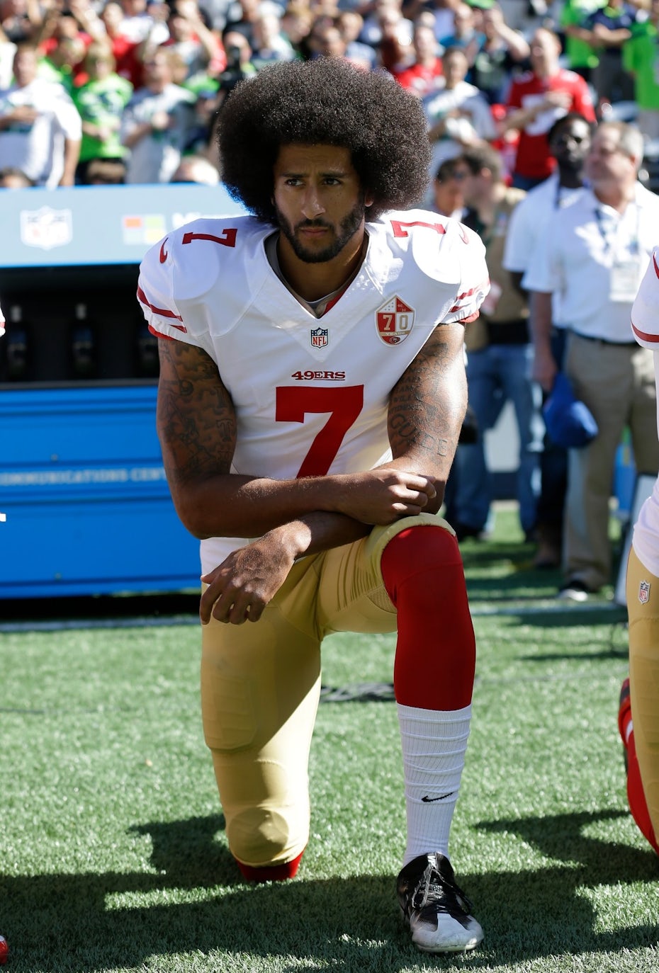Colin Kaepernick kneels in protest during an NFL game