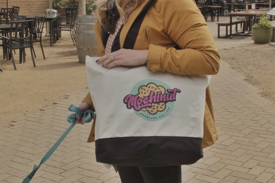 person carrying the mochinut tote bag