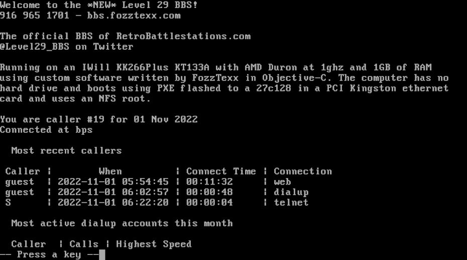 Captura de pantalla de una computadora con MS-DOS que accede a un sistema de tablón de anuncios en 2022.