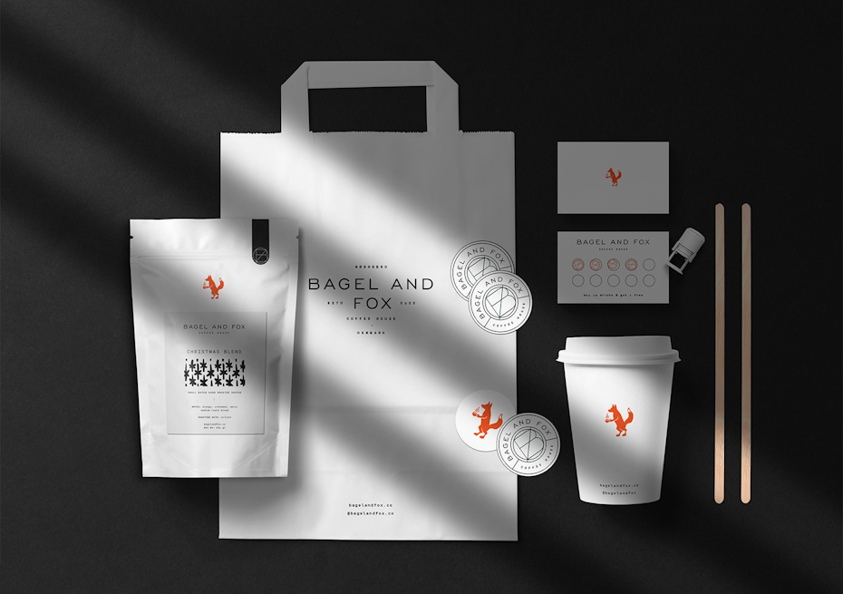bagel and fox logo on packaging materials like coffee bean bag, coffee cup, paper bag, business cards and stickers